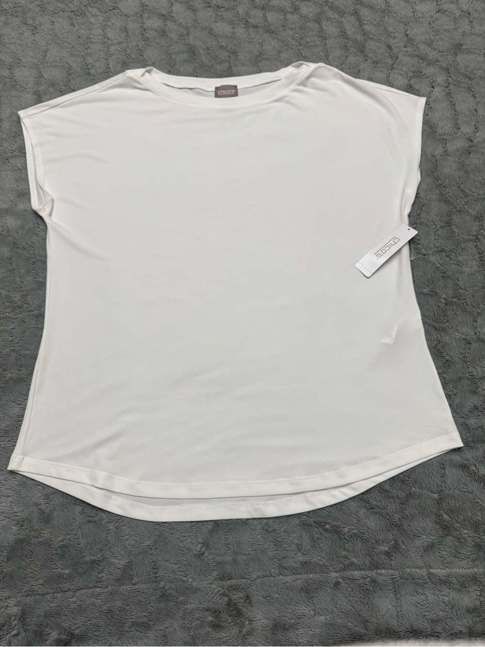 Chico’s NWT white Dolman sleeve, boatneck, top blouse.
Size 2